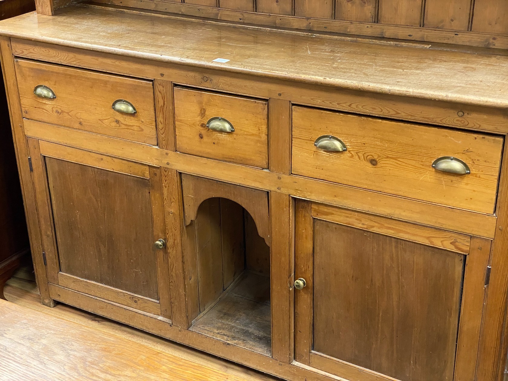 A Victorian pine dresser with boarded rack, length 182cm, depth 46cm, height 223cm